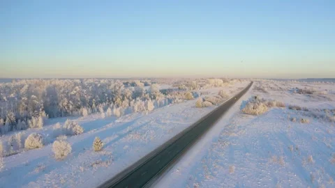 Winter landscape flight over the highway outside the city, aerial footage 库存影片 144483748