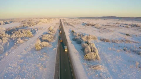 Winter landscape flight over the highway outside the city, aerial footage 库存影片 144483913
