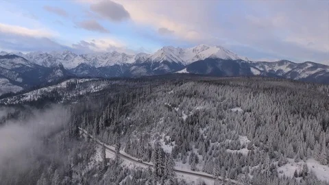 Winter Landscape Flight Over Snow Mountain Forest  Stock Footage 86999532