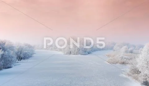 Winter landscape with frozen river.jpg Stock Photos