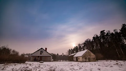Winter landscape with house in forest under cloudy sky. Stock Footage 167609770