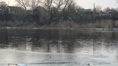 Winter landscape with ice on the river. Cracked ice on the lake. Frosty win.. Video stock 303048996