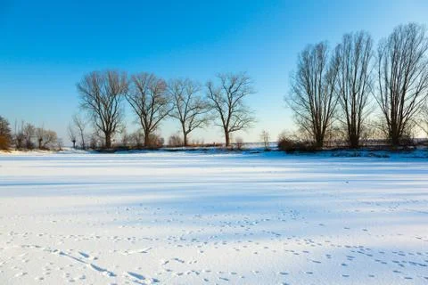 Winter landscape with lake Stock Photos