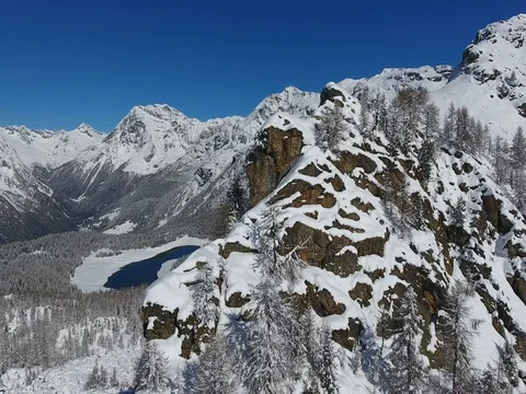 Winter landscape - Mountain covered with snow and Pal lake in Valmalenco Stock Footage 75464569