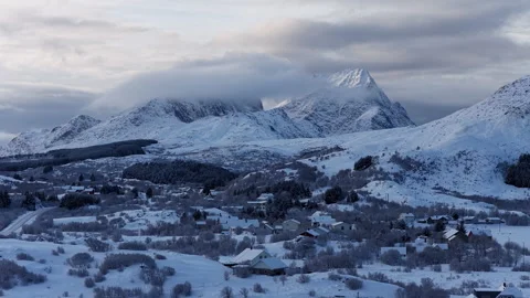 Winter landscape with moving clouds over snowy mountains, Norway Stock-Footage 342919484