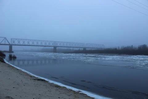 Winter landscape overlooking the river in cold tones Stock Photos