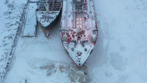 Winter landscape of the river and moored ships at the shore. Stock Footage 156664565