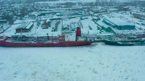 Winter landscape of the river and moored ships at the shore. Stock Footage 156679663