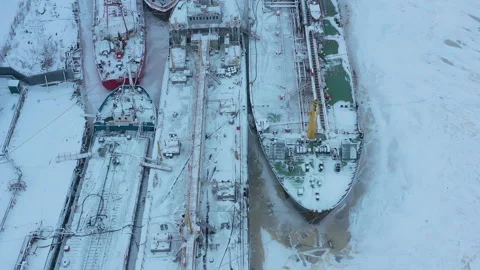 Winter landscape of the river and moored ships at the shore. Stock Footage 157534025