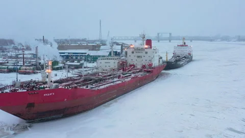 Winter landscape of the river and moored ships at the shore. Stock Footage 157868875