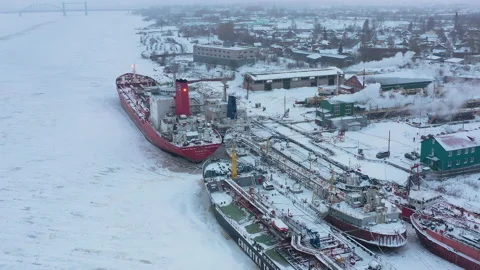 Winter landscape of the river and moored ships at the shore. Stock Footage 158316053