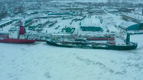 Winter landscape of the river and moored ships at the shore. Stock Footage 158679498