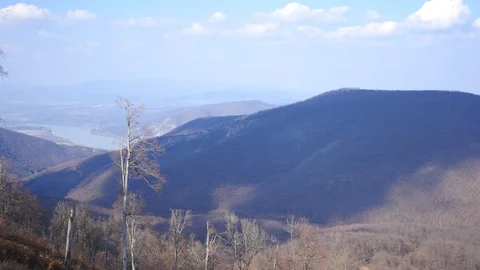Winter landscape with a river between the hills Video stock 106197216
