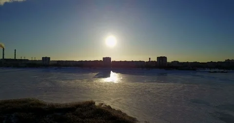 Winter landscape by the river covered with ice Stock Footage 73034865