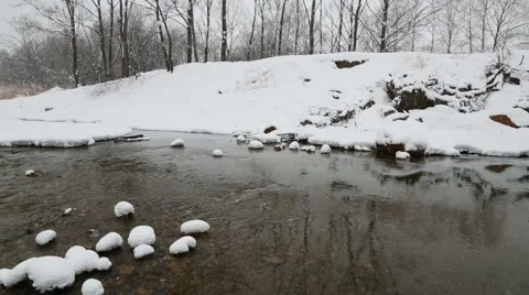 Winter landscape on the river with falling snow Stock Footage 47890584