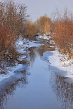 Winter landscape with river Stock Photos