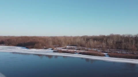 Winter landscape with river, trees, water, ice Video stock 170386918