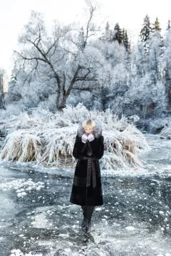 Winter landscape, river under the ice Stock Photos