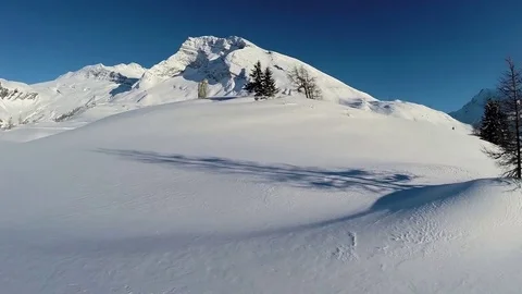 Winter landscape snow covered mountains aerial view fly over Stock Footage 75214840