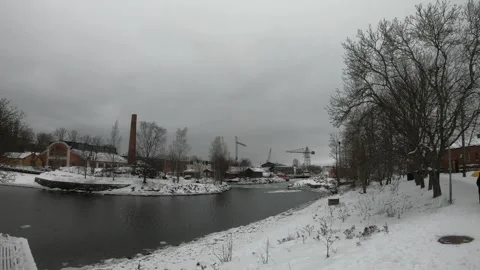 Winter Landscape with Snowy River and Industrial Background Stock Footage 342282046