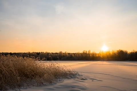 Winter landscape with sunrise. The path in the snow. Stock Photos
