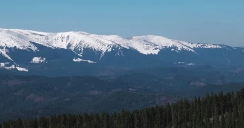 Winter Landscape With Trees, Snowy Mountains and Clouds, Panning View Video stock 74157578