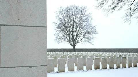 WInter landscape : World War One British military cemetery after snowfall Stock Footage 101848243