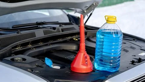 Winter liquid for car windshield Фото