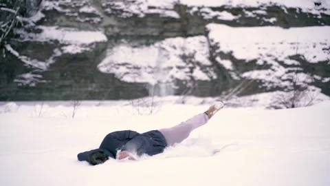 Winter. The man falls into the snow. Stock Footage 154332006