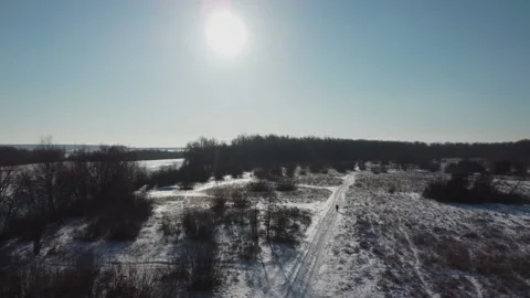 Winter meadow, man, sun, winter 스톡 동영상 167508530