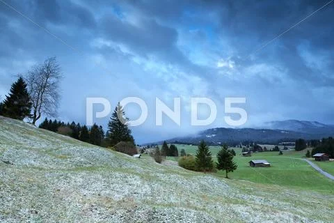 Winter morning in Alpine countryside Stock Photos