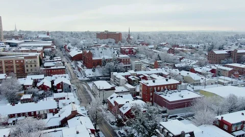 Winter morning in a small American town on the East Coast, trees and roofs Stock Footage 104864933