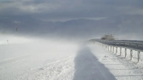 Winter mountain closed road with intense snowstorm snow blizzard drifting Stock-Footage 170122008