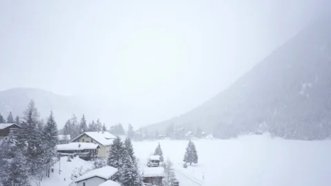 Winter in the mountain - heavy snow on a cloudy day Stock Footage 104900313
