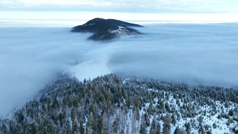 Winter Mountain Peak Above Clouds Stock Footage 335526082
