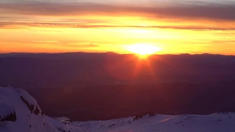Winter Mountain Peak Orange Sunset 4K Stock Footage 76516439