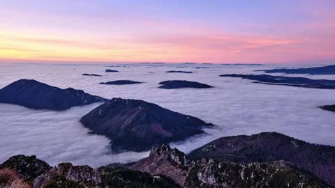 Winter Mountain Peaks over Cloud Inversion at Evening Sunset Stock Footage 326203205