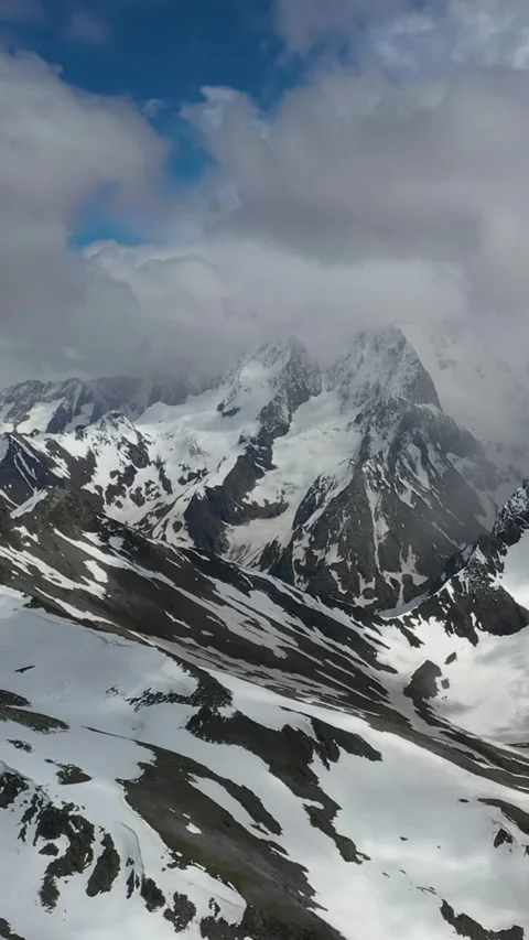 Winter Mountain Range Covered in Snow with Scenic Views Stock Footage 288014626