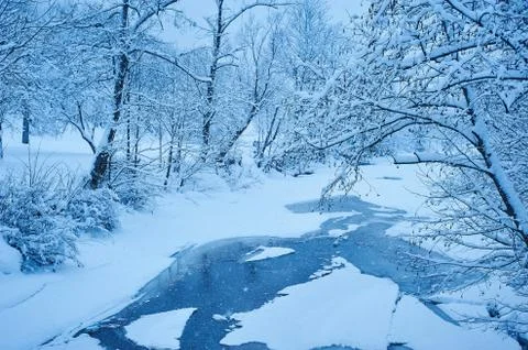 Winter mountain river after the snowfall Stock Photos