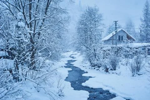 Winter mountain river after the snowfall 写真素材
