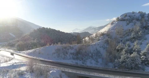 Winter mountain road - Aerial 4K Stock Footage 83665645