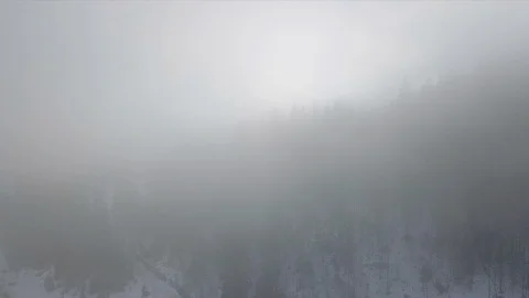 Winter mountain snowy forest in the clouds Stock Footage 125455838