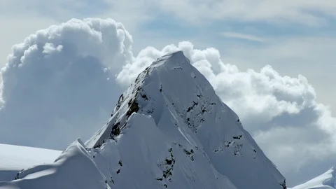 Winter mountain summit with cloudy sky background in day time Stock Footage 121576896