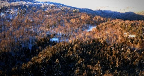 Winter Mountain Sunset Flyover Stock Footage 123929572