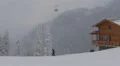 Winter Mountain Wooden Cabin Cable Car Passing Establishing Shot Skiers Resort HD Footage