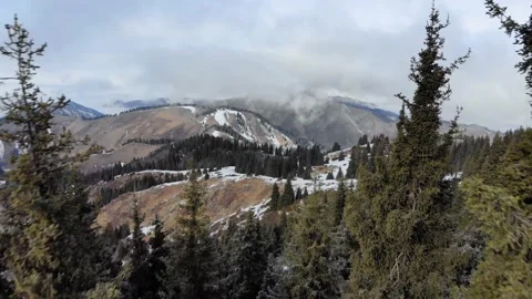 Winter mountains are hidden in the clouds 스톡 동영상 168740545