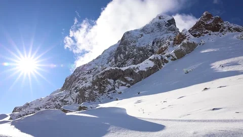 Winter mountains clouds and sun Stock Footage 239350555
