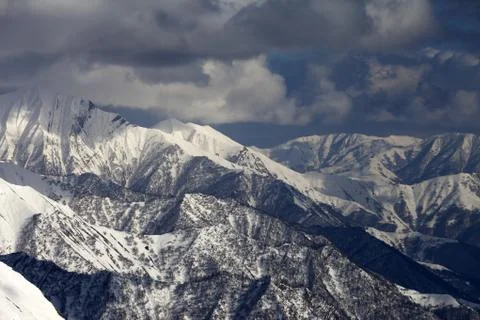 Winter mountains in clouds. View from ski slopes Stock Photos