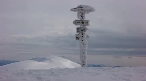 Winter Mountains Cloudscape With Direction Sign Timelapse Stock Footage 61507067