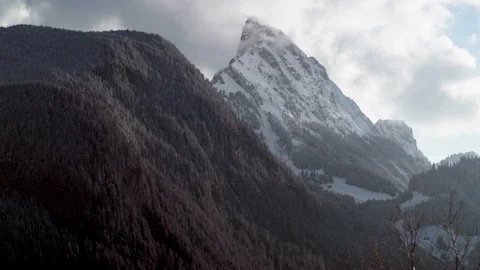 Winter mountains with cloudy sky background during day time Stock Footage 121574886